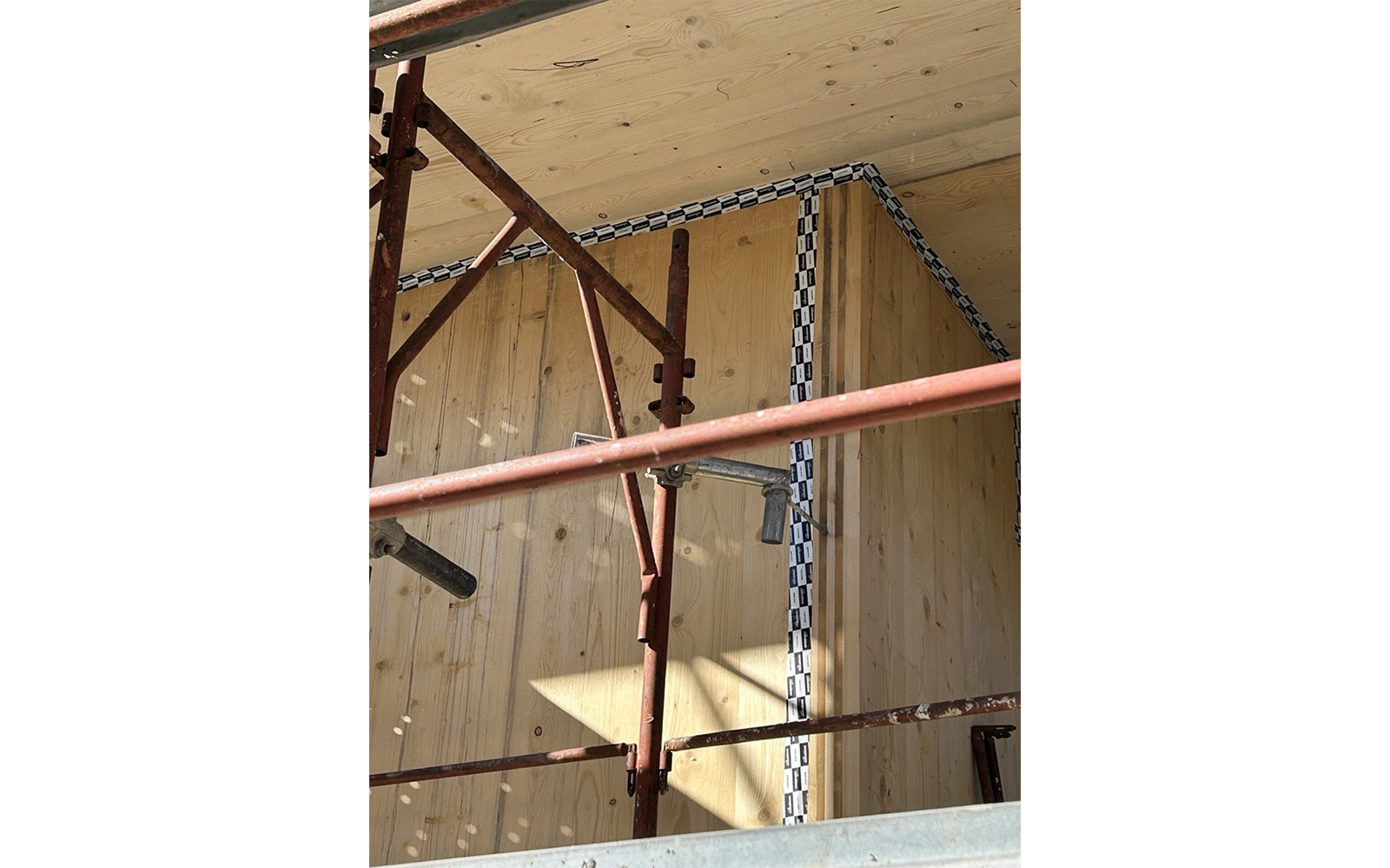 Airtightness tape in building site with cross-laminated timber elements 